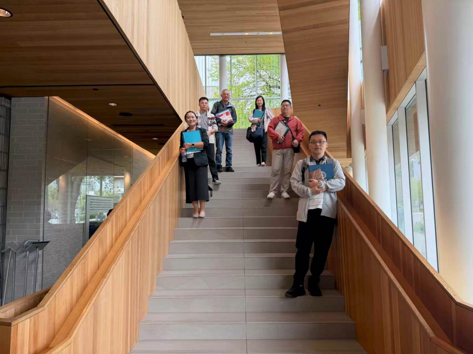 Six educators visiting a Canadian educational campus during professional development training